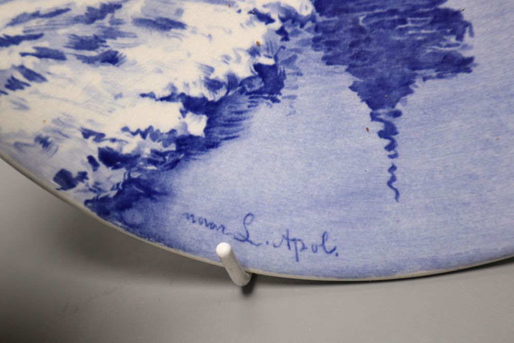 A delftware vase, 22cm, delft vase and a painted wall plate, 26cm